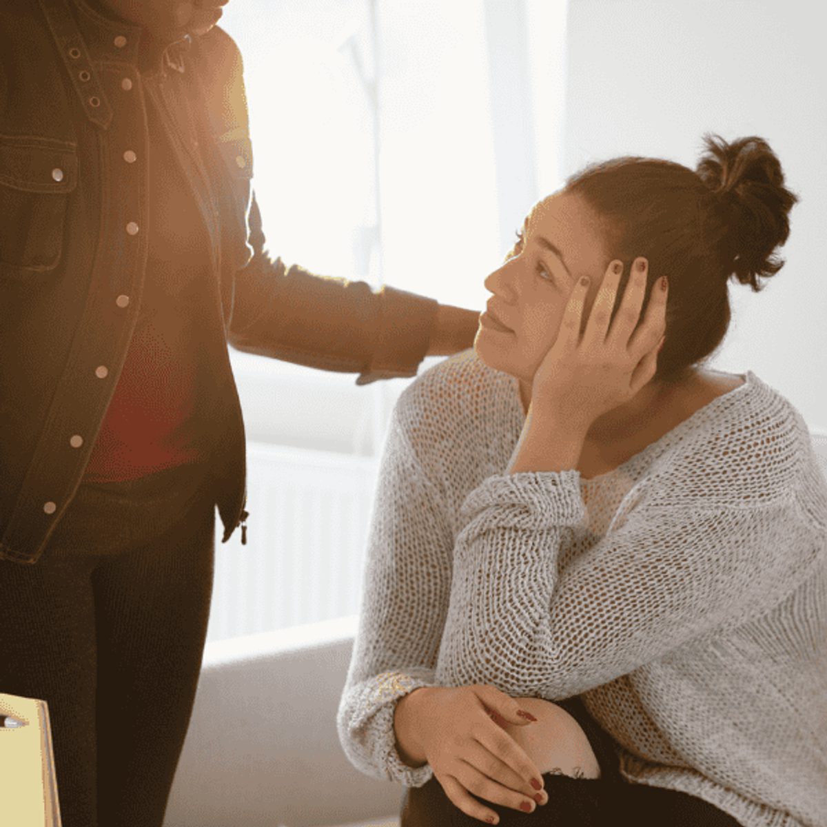 Woman speaking to someone about her chronic mental health condition